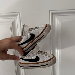 Nike Kids White Sneakers with Black Swoosh and Brown Trim